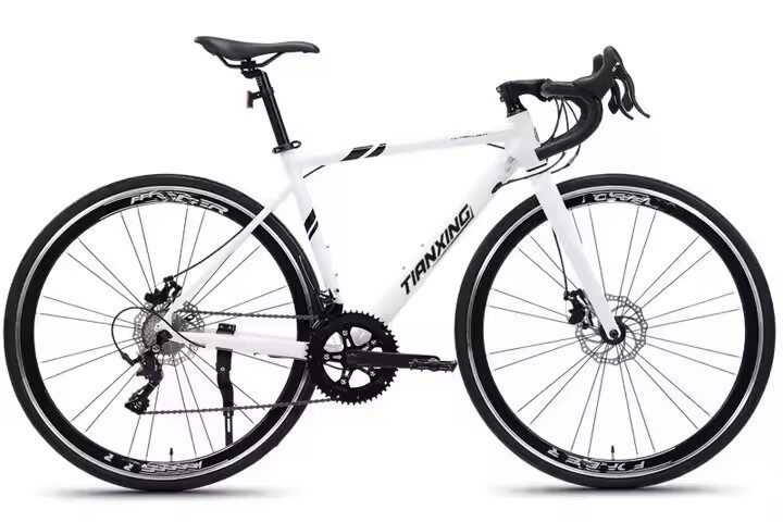 Modern adult road bike with fashionable frame and disc brakes from factory