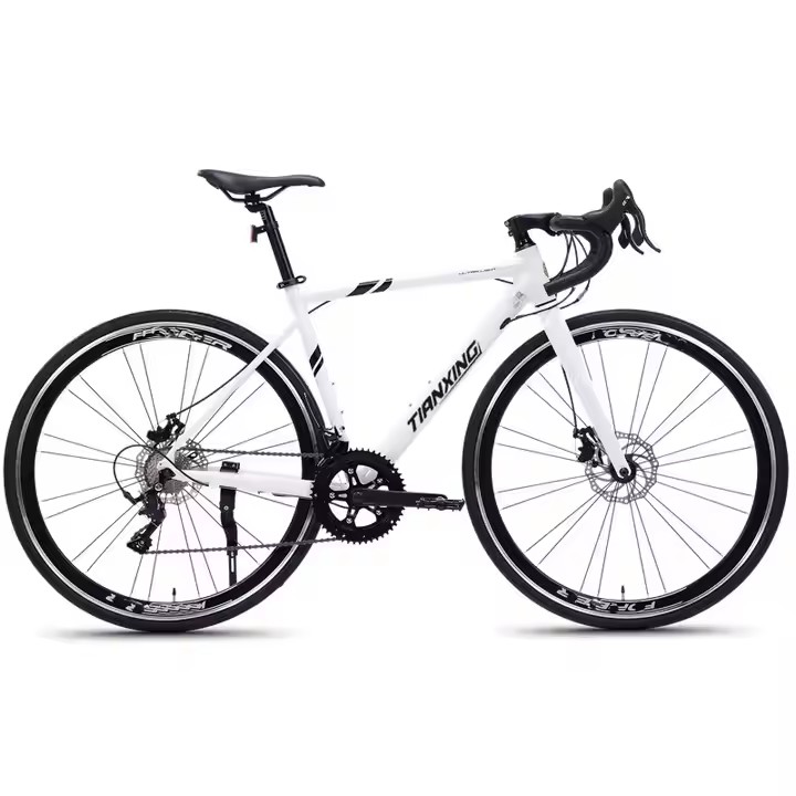 Modern adult road bike with fashionable frame and disc brakes from factory