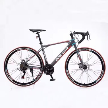Modern adult road bike with fashionable frame and disc brakes from factory