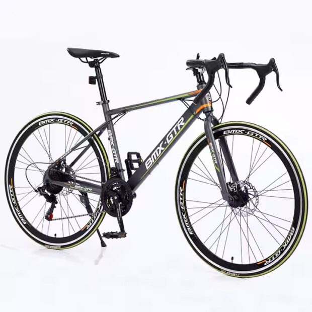 Modern adult road bike with fashionable frame and disc brakes from factory