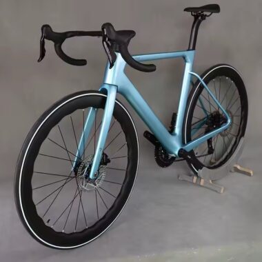 Full carbon fiber road bike with aerodynamic frame and disc brakes