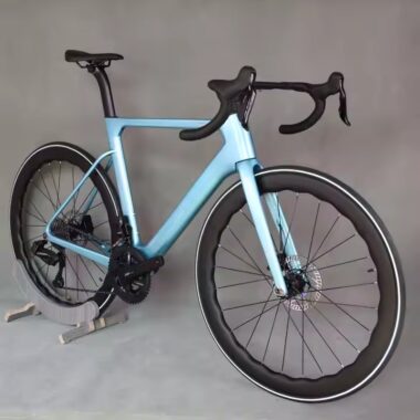 Full carbon fiber road bike with aerodynamic frame and disc brakes