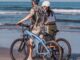 Hybrid electric bike for urban and mountain riding with front suspension